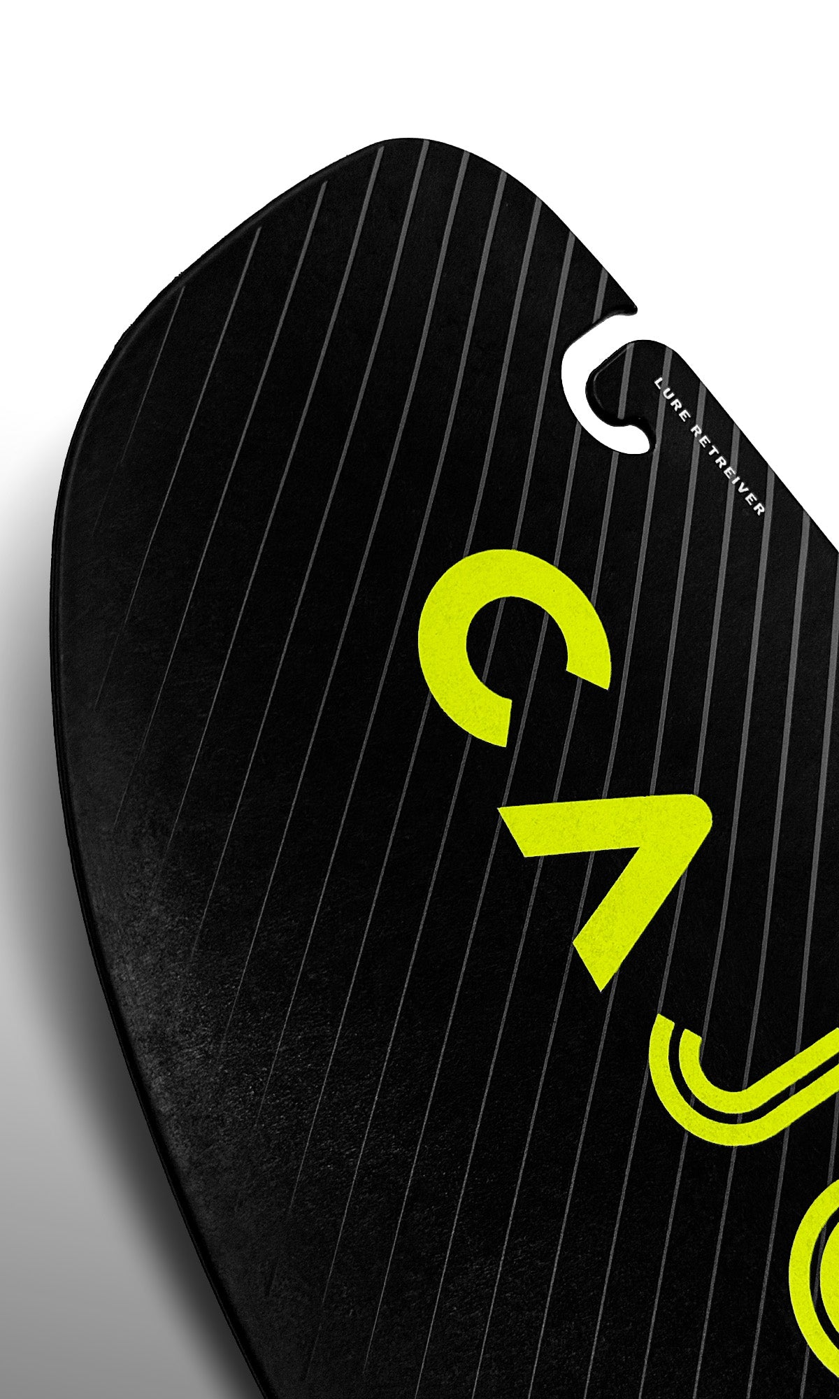 Avalon Carbon Angler Pro paddle blade close-up showing yellow Cajo logo and carbon texture