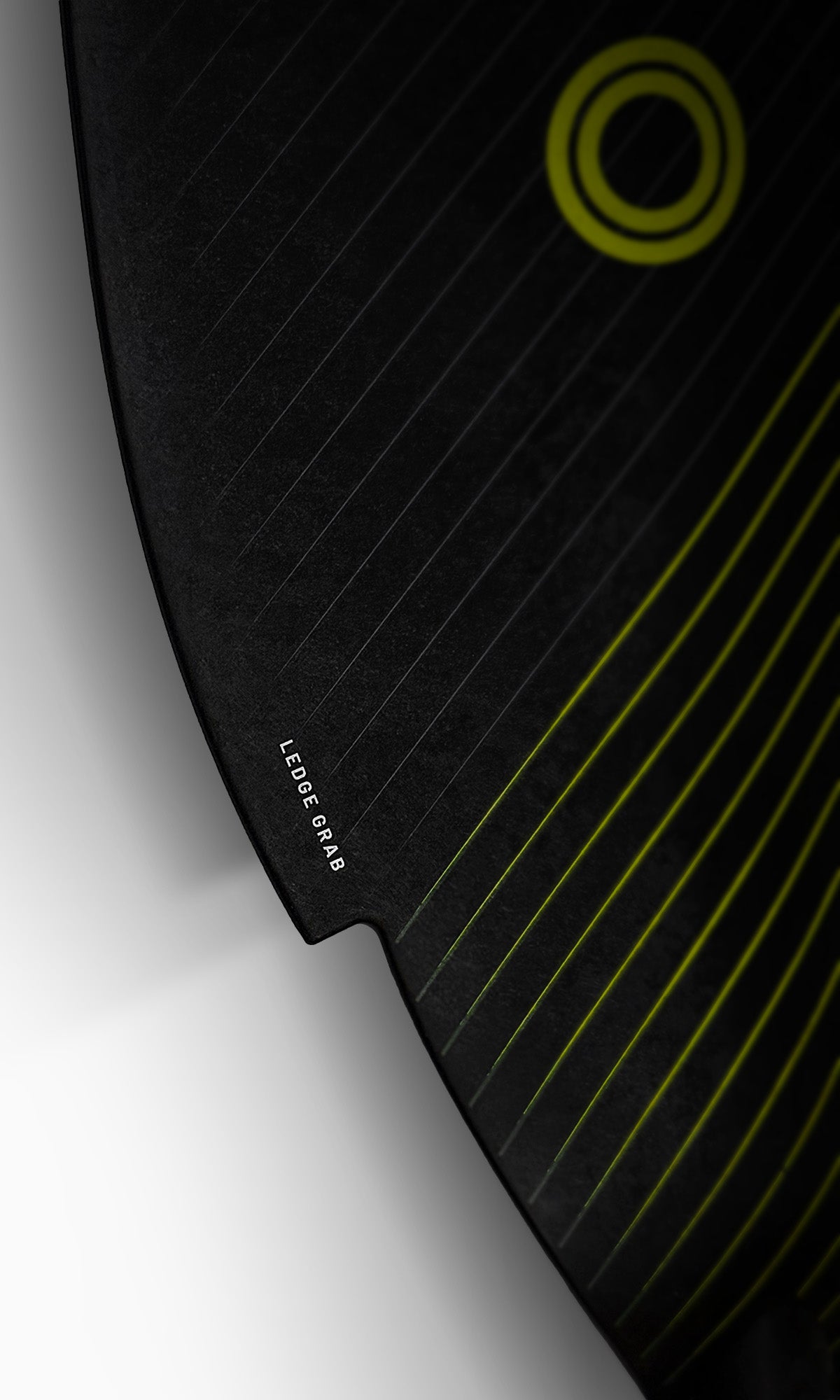 Avalon Carbon Angler Pro paddle blade edge close-up with yellow line pattern and ring logo