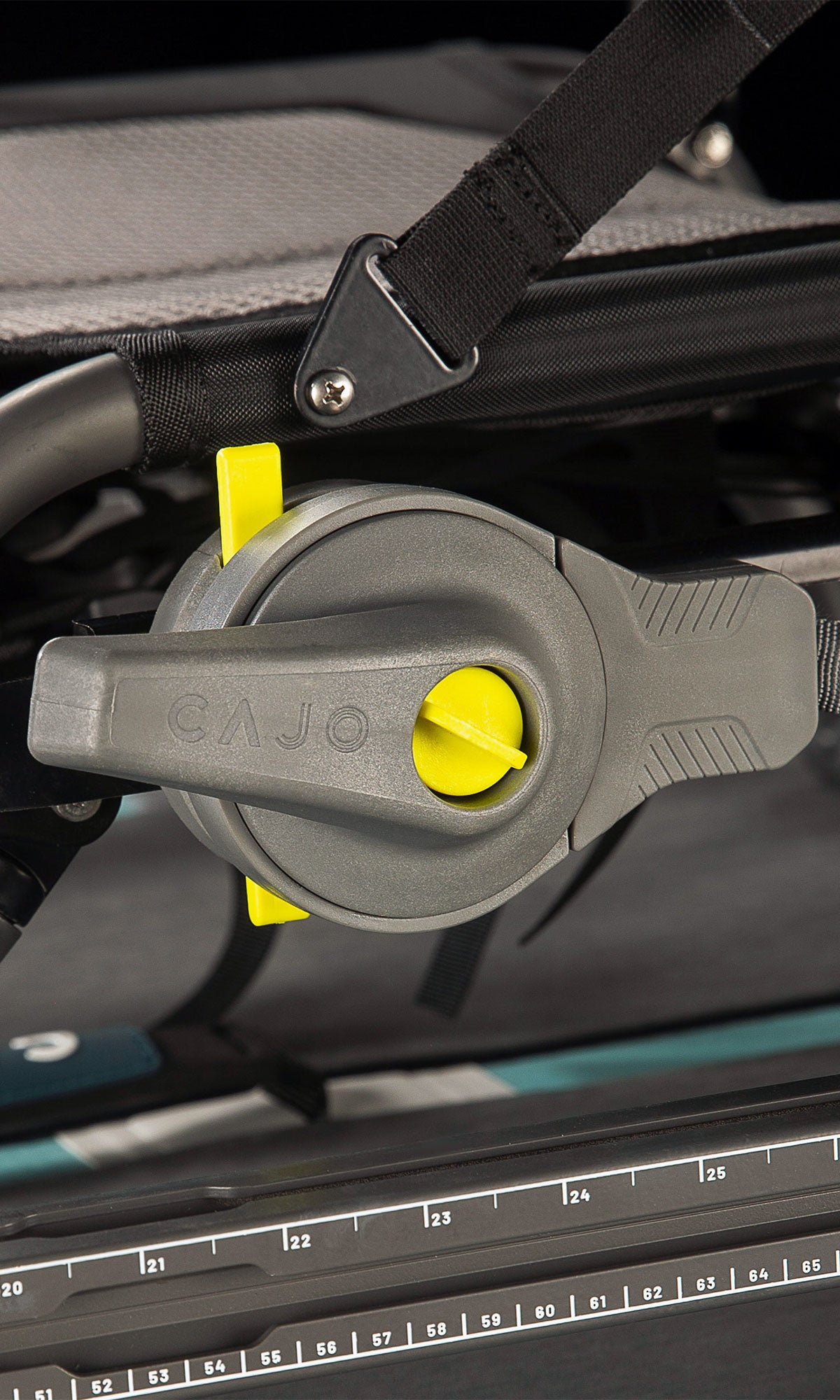 Traverse drive system steering handle close-up, grey lever with yellow knob